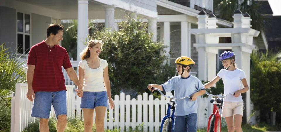 A smiling family with young children